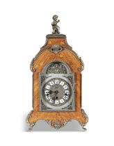 A KINGWOOD AND MARQUETRY INLAID BRACKET CLOCK Surmounted with a with putti finial,