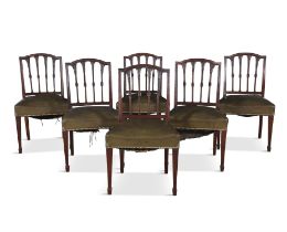 A SET OF SIX MAHOGANY AND LEATHER UPHOLSTERED DINING CHAIRS, 19TH CENTURY, each with arched