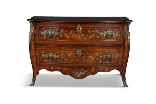 A NORTH EUROPEAN INLAID FRUITWOOD SERPENTINE FRONT COMMODE, the top with scrolls and putto,