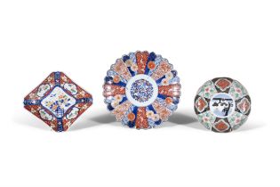 A COLLECTION OF THREE IMARI DISHES one of foliate design, 31cm diameter; one small circular