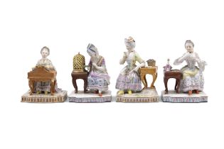 A COLLECTION OF FOUR MEISSEN PORCELAIN FIGURAL GROUPS DEPICTING THE SENSES each seated at