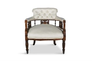 A MAHOGANY FRAMED BUTTON BACK ARMCHAIR, the padded back rest, arms and seat upholstered in cream