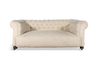 A CHESTERFIELD SETTEE, of typical form, upholstered in cream/beige fabric. 182cm wide, 66cm high