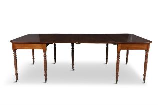AN IRISH GEORGE IV MAHOGANY EXTENDING DINING TABLE, the figured rectangular top with rounded
