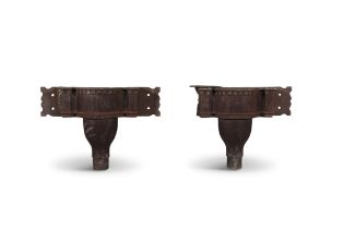 A PAIR OF VICTORIAN CAST IRON DRAIN HOPPERS, each of serpentine form, with dentil cornice,