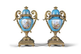 A PAIR OF FRENCH 'SEVRES' STYLE PORCELAIN GARNITURE VASES, 19TH CENTURY of ovoid shape,