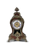 A FRENCH BOULLE WORK MANTLE CLOCK, 19TH CENTURY the arched case applied with ormolu finial and