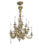 A GILT BRASS FIFTEEN LIGHT CHANDELIER the central pole with open twist acanthus leaf