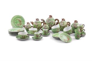 A TWENTY FOUR PIECE JAPANESE GEISHA LITHOPHANE PORCELAIN DRAGON TEA AND COFFEE SERVICE in green