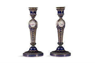 A PAIR OF FRENCH SEVRES BLUE, GILT AND JEWELLED PORCELAIN CANDLESTICKS, 19TH CENTURY each of