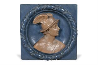 AN ITALIAN FAIENCE GLAZED PANEL, 19TH CENTURY, centred with a bust of Mercury in relief,