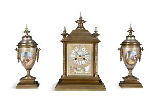 A FRENCH GILT METAL AND PORCELAIN MOUNTED THREE PIECE CLOCK GARNITURE, 19TH CENTURY the mantle