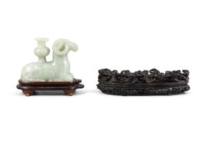A SET OF TWO DESK DECORATIONS WITH A GREEN HARDSTONE OF SITTING SHEEP WITH VASE AND A CARVED