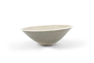 A CELADON BOWL WITH DOUBLE FISH 宋代 青釉魚蓮紋鬥笠碗 China, Song dynasty. D. 15.2 cm