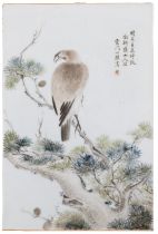 A QIANJIANGCAI ‘PINE AND BIRD’ PORCELAIN PANEL WITH AN INVOICE FROM WONG YUK KY ANTIQUE SHOP IN