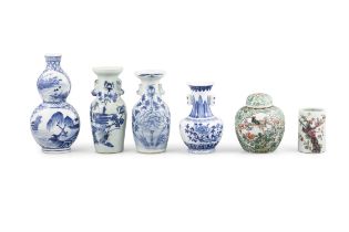 A GROUP OF SIX PORCELAINS, CONSISTING OF FOUR BLUE AND WHITE VASES; A FAMILLE VERTE GINGER POT AND
