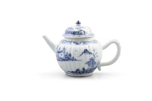 A CHINESE BLUE AND WHITE 'LANDSCAPE' TEAPOT 18世紀 青花山水紋茶壺 China, 18th century W: 20cm