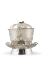 A SILVER TEACUP WITH SILVER-PLATED COVER AND SAUCER INCISED WITH BIRDS, FLOWERS AND BAMBOO,