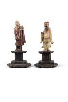 TWO PAINTED SOAPSTONE FIGURES OF THE DAOIST IMMORTAL 'SHOUXING' AND 'ZHONG HANLI' ON HIGH