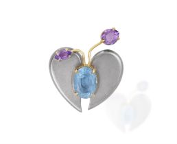 AN AMETHYST AND TOPAZ BROOCH, BY DEPY CHANDRIS, of bi-coloured design, modelled as s butterfly,