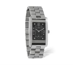 A STAINLESS STEEL QUARTZ WRISTWATCH, BY BAUME & MERCIER, the rectangular-shaped black dial with