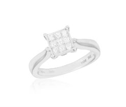 A DIAMOND RING, the raised square-shaped mount set with square-shaped diamonds, to a plain polished