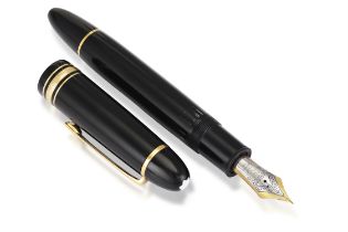 A FOUNTAIN PEN, BY MONTBLANC, black coloured with gilt highlights engraved ‘Meisterstuck No 149