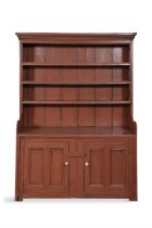 A 19TH CENTURY PAINTED PINE DRESSER, the moulded cornice above three open shelves and plain