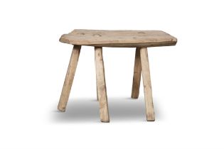 A PLAIN PANEL MILKING STOOL with five spindle supports. 34cm high, 40cm wide