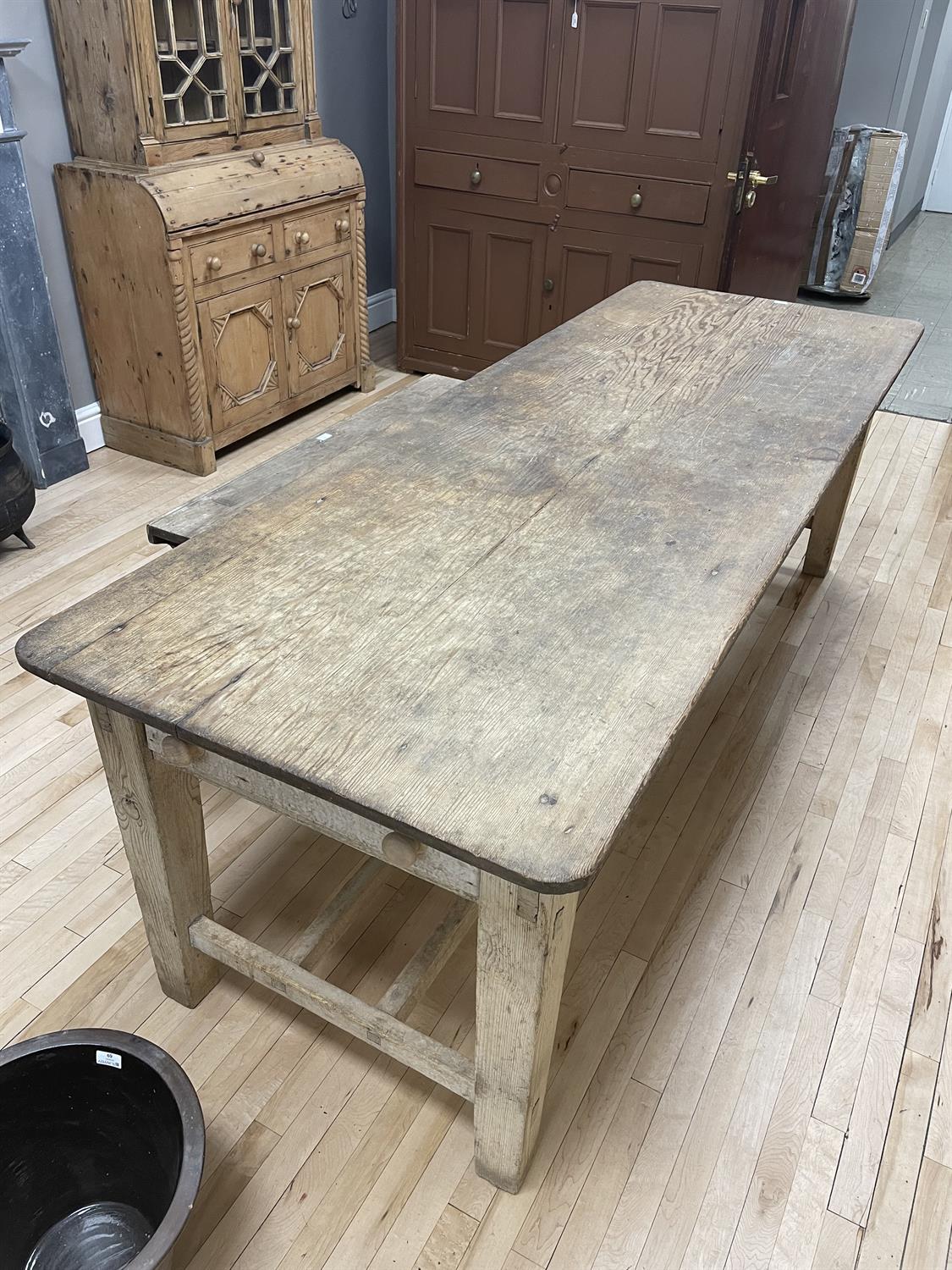 A 19TH CENTURY PITCH PINE FARMHOUSE TABLE, the two-plank rectangular top with rounded corners, - Image 6 of 10