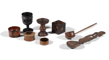 A COLLECTION OF TREEN, including a Welsh spoon, a Georgian lignum vitae bowl,