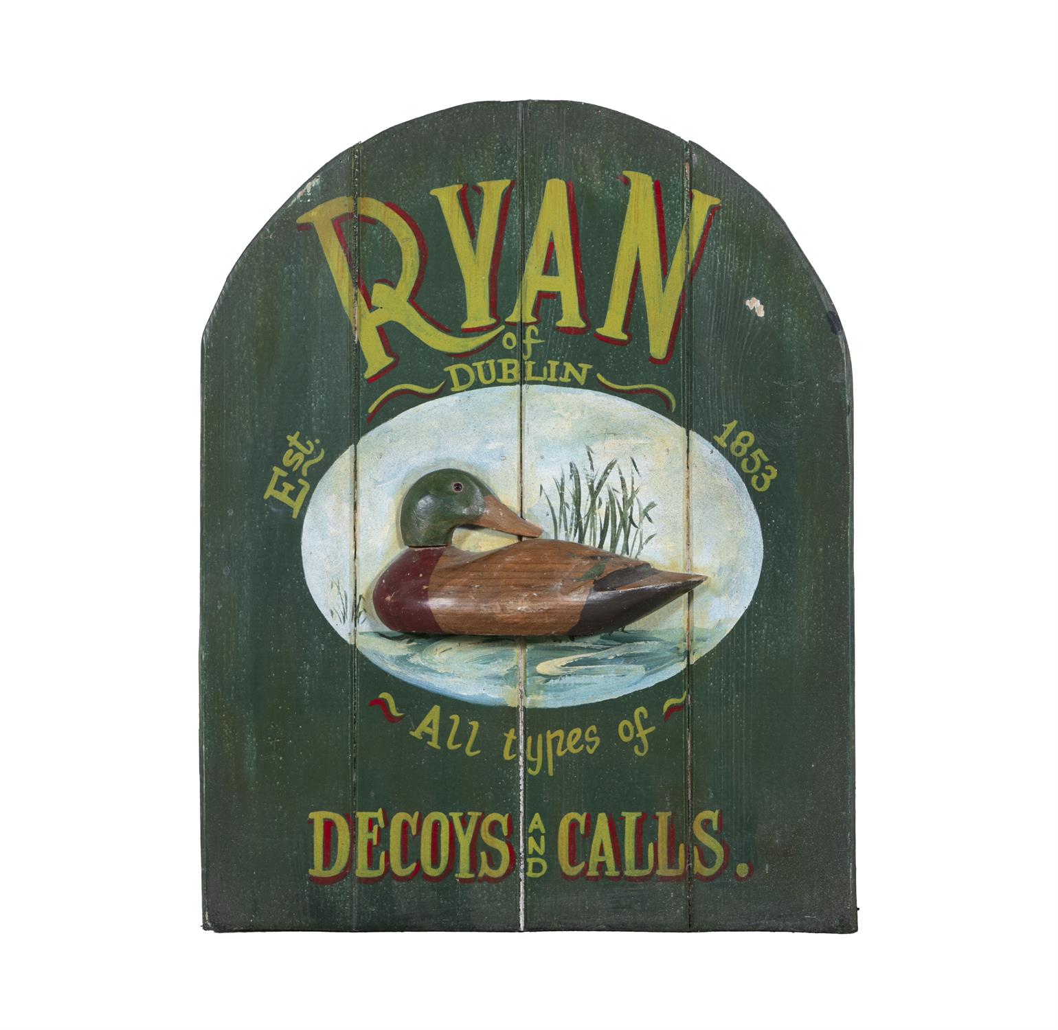A PAINTED PINE SHOP SIGN, arch-top with relief duck and inscribed 'Ryan of Dublin, Est.