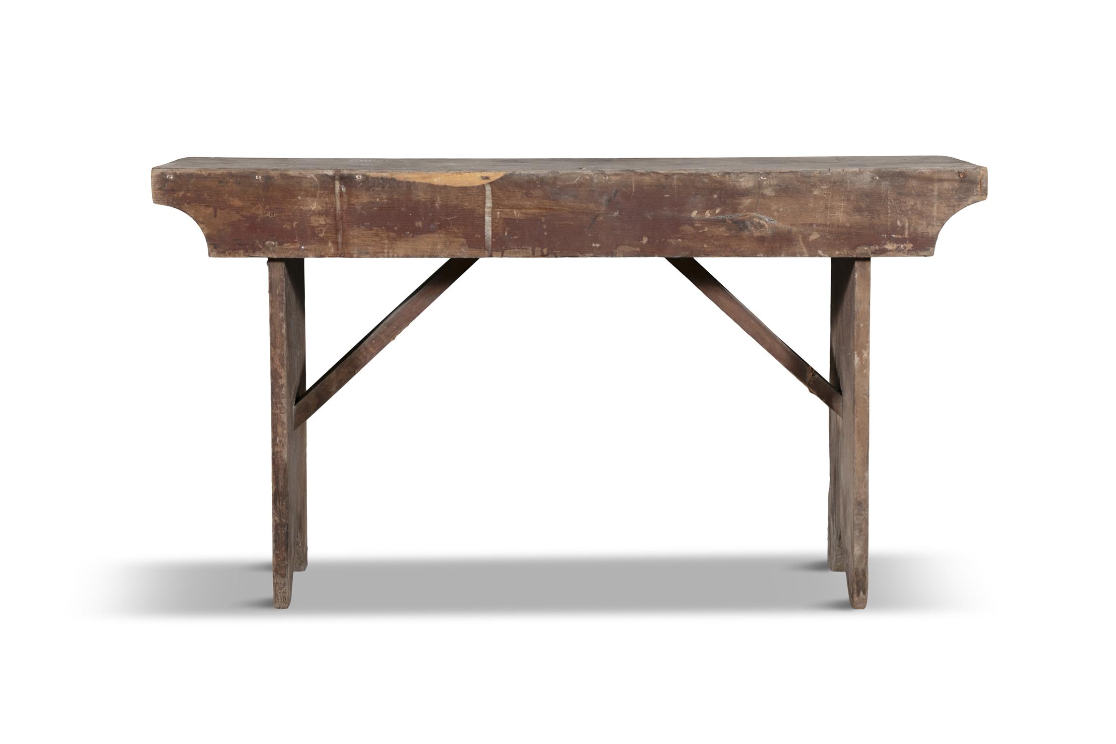 A 19TH CENTURY PINE BENCH, the plain panel seat, on slated side supports. 112cm wide, 63.5cm high