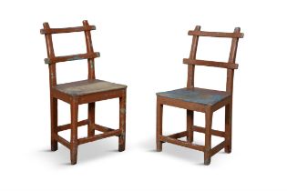 A PAIR OF PAINTED PINE CHAIRS with twin rail backs panel seats and square chamfered legs with