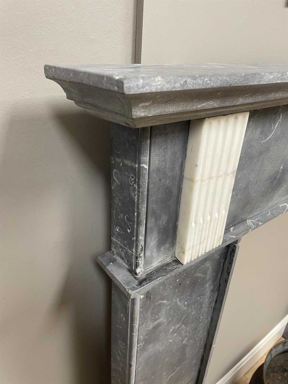 A KILKENNY BLACK MARBLE FIREPLACE C. 1800 with frieze pediment on plain column supports. - Image 11 of 13