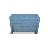 A 19TH CENTURY BLUE PAINTED PINE MEAL BIN, the hinged slope front above tapering slated sides on