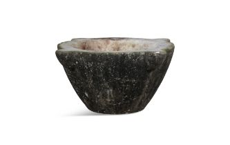 A LARGE WHITE MARBLE CIRCULAR MORTAR, the tapering bowl with four exterior lug hands and