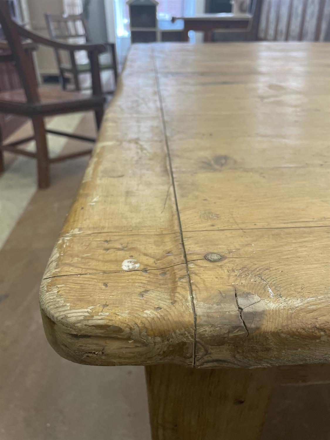 A LARGE PINE RECTANGULAR FARMHOUSE TABLE, LATE 19TH CENTURY, on turned tapering legs. - Image 8 of 10