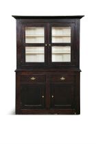 A 19TH CENTURY PINE CUPBOARD, the moulded cornice and twin glazed panel doors with painted