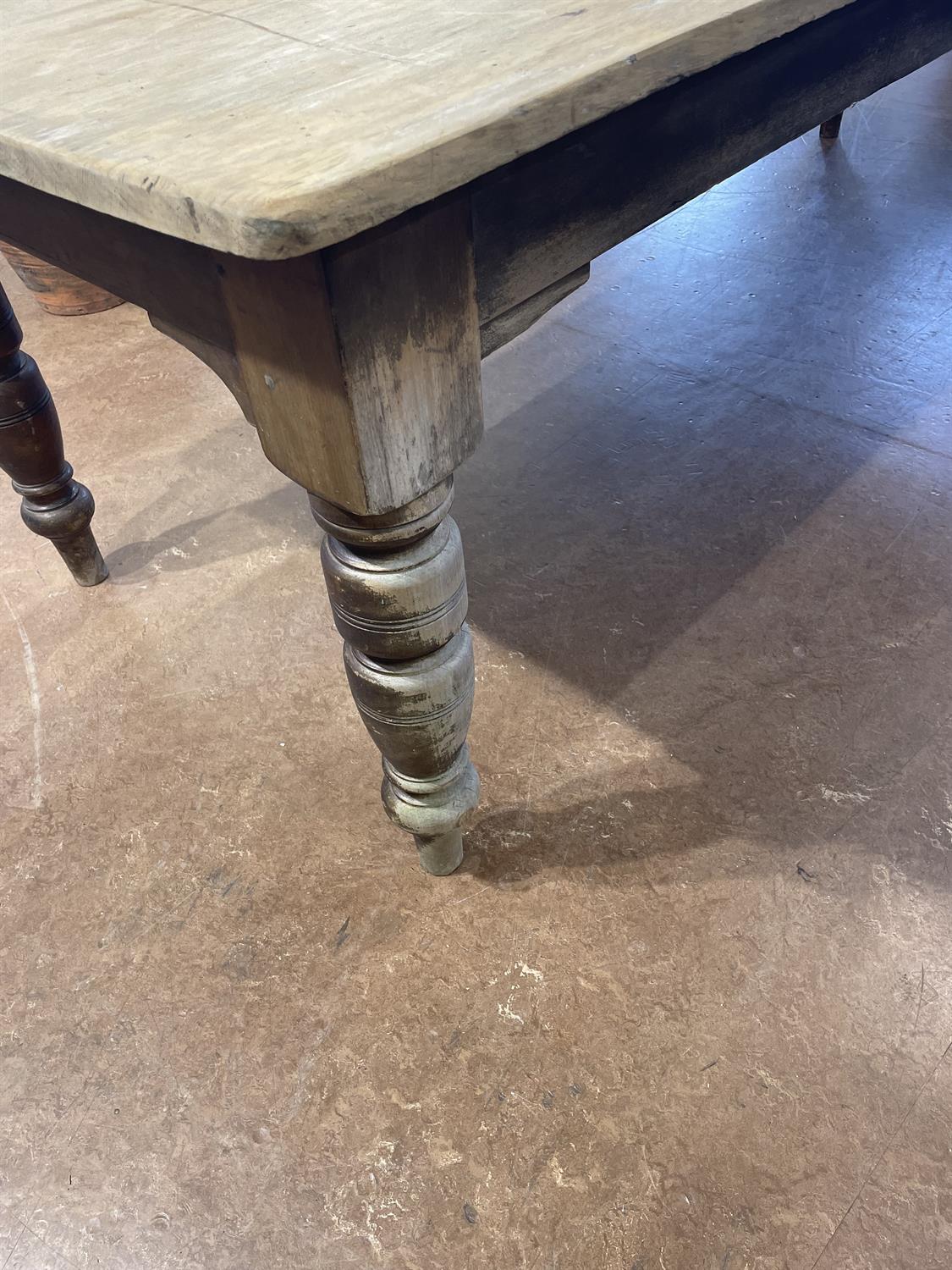 A LARGE 19TH CENTURY STAINED PINE KITCHEN TABLE WITH SYCAMORE TOP, the plain two panel top - Image 8 of 15