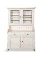 AN EARLY 20TH CENTURY WHITE PAINTED DRESSER, moulded top above a cabinet with two glazed doors