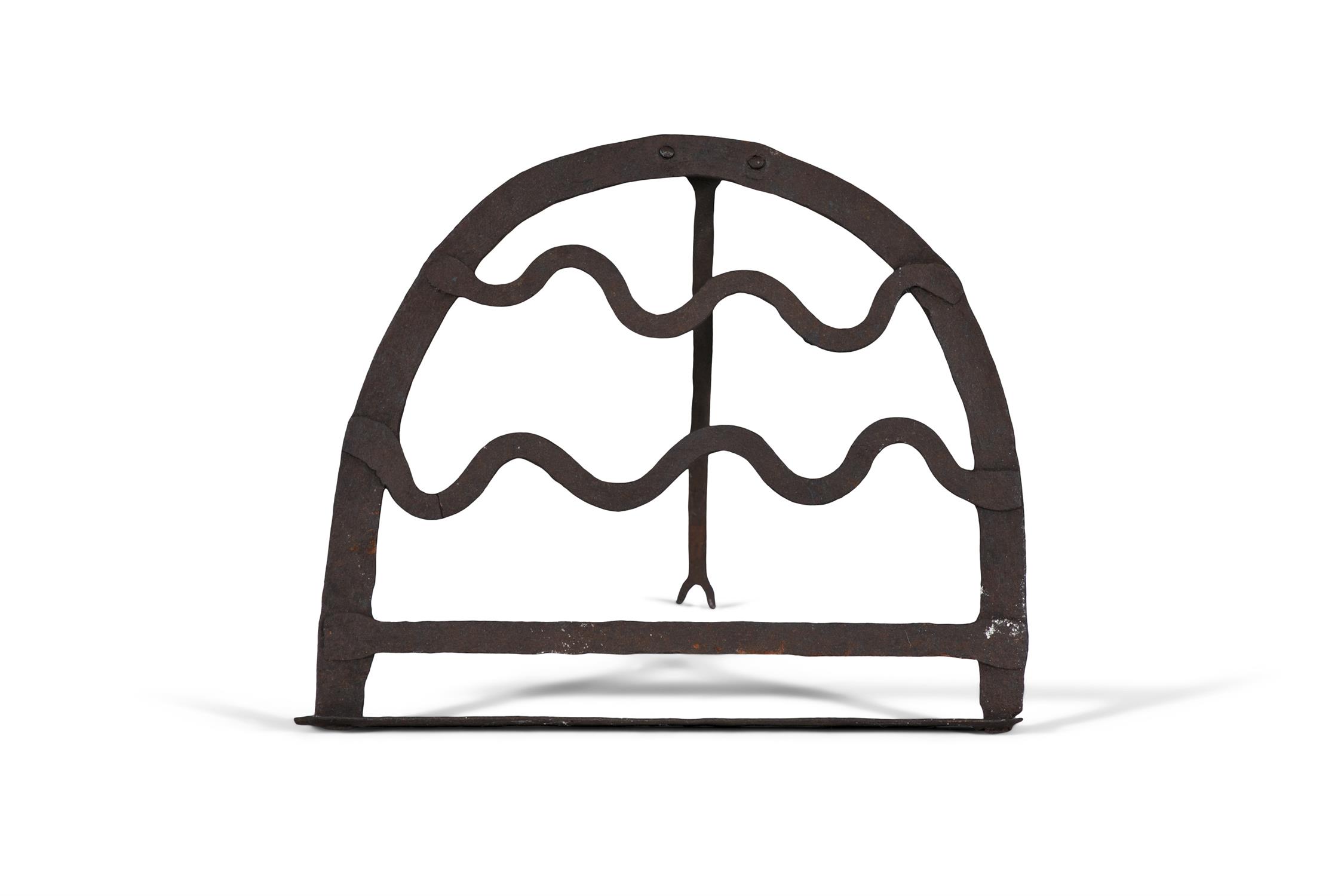 AN IRISH WROUGHT IRON D-SHAPED HARNAN STAND decorated with wavy cross bars, with hinged arm. - Image 2 of 2