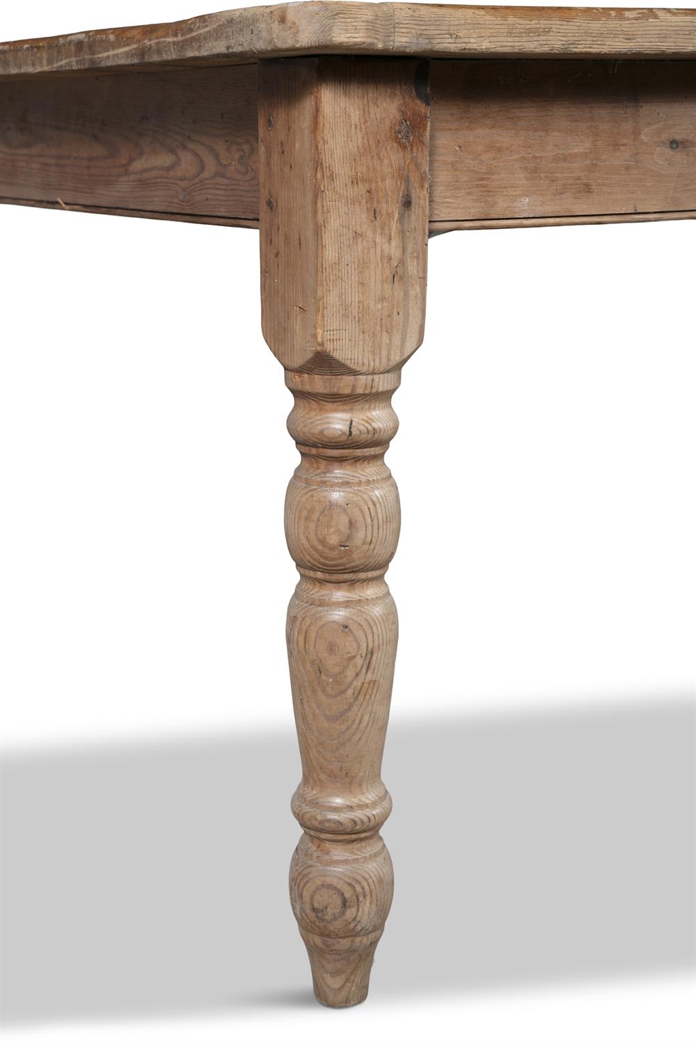 A LARGE PINE RECTANGULAR FARMHOUSE TABLE, LATE 19TH CENTURY, on turned tapering legs. - Image 2 of 10