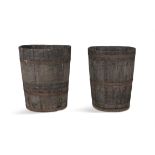 TWO 19TH CENTURY BRASS BANDED TURF BUCKETS, of shaped oval form and coopered construction,