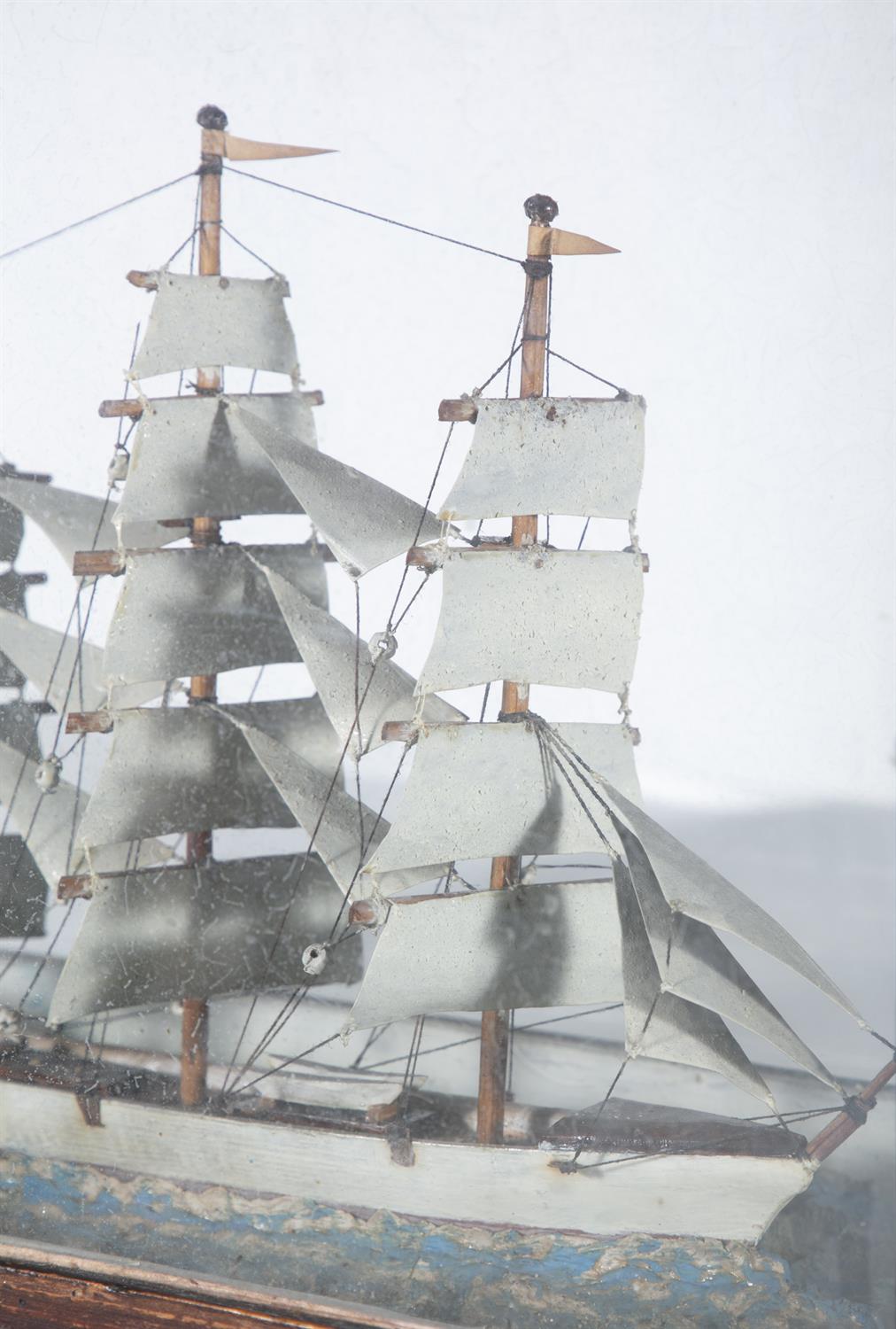 A DIORAMA OF A THREE MASTED SQUARE RIGGED MODEL BARK SHIP the stained timber case of rectangular - Image 3 of 5