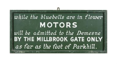 A GREEN AND WHITE PAINTED TIMBER ESTATE SIGN 'WHILE THE BLUEBELLS ARE IN FLOWER MOTORS WILL BE