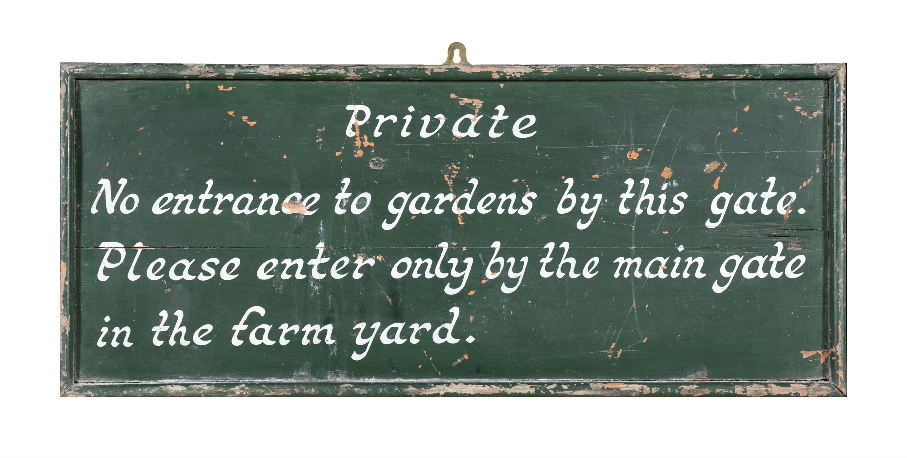 A GREEN AND WHITE PAINTED TIMBER SIGN 'PRIVATE NO ENTRANCE TO GARDENS BY THIS GATE.