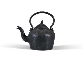 A LARGE VICTORIAN BLACK CAST IRON TEA-KETTLE, with fitted lid and raised loop handle, 38cm high,