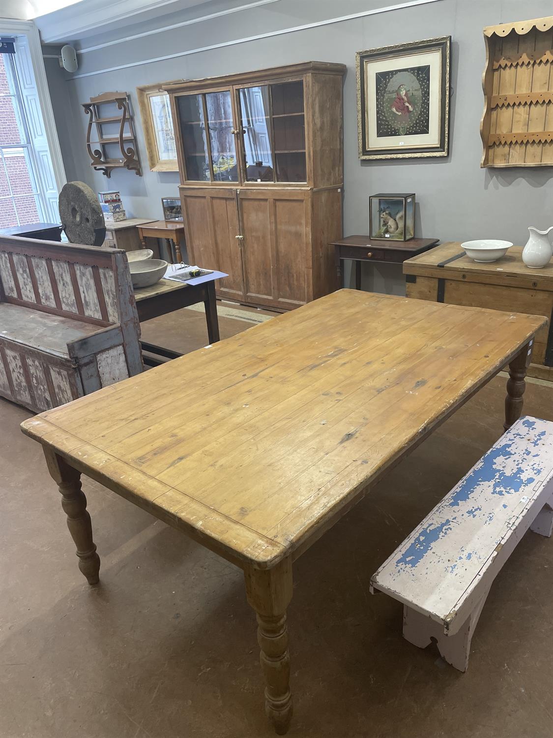 A LARGE PINE RECTANGULAR FARMHOUSE TABLE, LATE 19TH CENTURY, on turned tapering legs. - Image 9 of 10