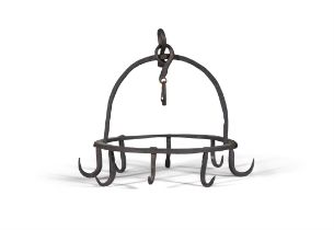 A CAST IRON 'DUTCH CROWN' GAME-HANGER, the circular frame with applied hooks. 26cm diameter,